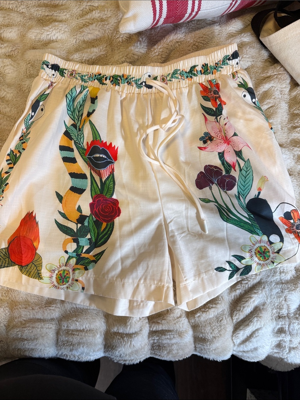 Cotton and linen.  Women's Cream Floral Print Drawstring Shorts. Made in Italy.